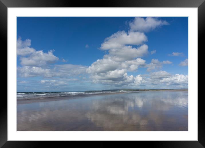 Clouds reflecting on a deserted Westward Ho beach Framed Mounted Print by Tony Twyman