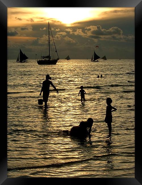 Silhouettes at Sunset Framed Print by Serena Bowles