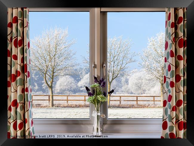 Window onto a winter snowy trees Framed Print by Simon Bratt LRPS