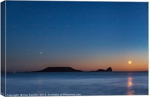 Worms Head with the Moon Setting Canvas Print by Dan Santillo