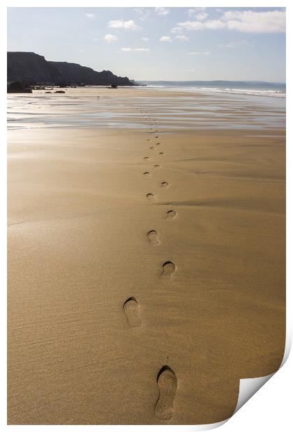 Footsteps on a deserted Cornish beach Print by Tony Twyman