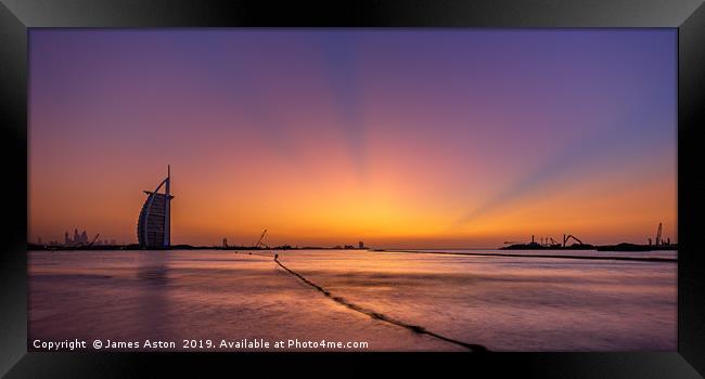 Sunset over the Palm Dubai Framed Print by James Aston