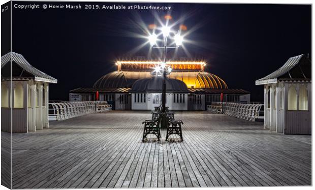 The Pier at Night Canvas Print by Howie Marsh