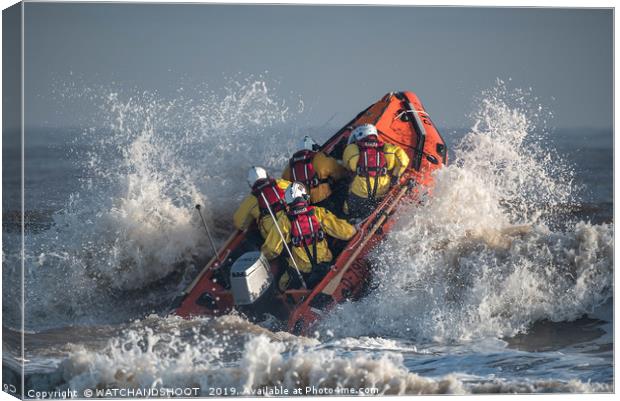 To the rescue - an RNLI inshore lifeboat launches  Canvas Print by WATCHANDSHOOT 