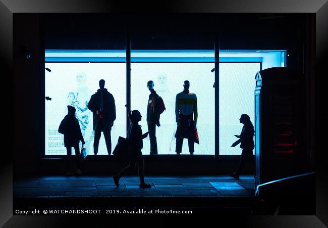 Figures of the night - London West End shoppers Framed Print by WATCHANDSHOOT 