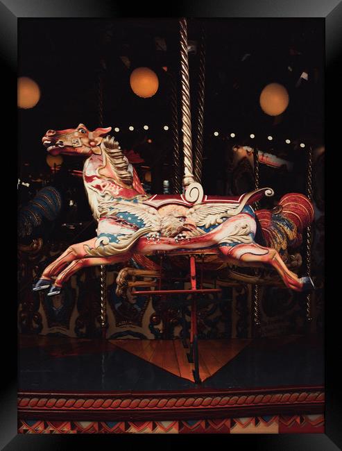 Fairground Galloper. Framed Print by Maggie McCall