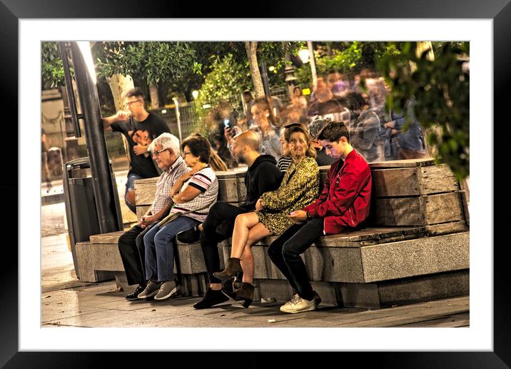People sitting and relaxing in the evening Framed Mounted Print by Jose Manuel Espigares Garc
