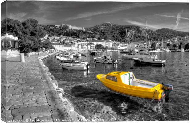 Yellow boat of Hvar in mono Canvas Print by Rob Hawkins