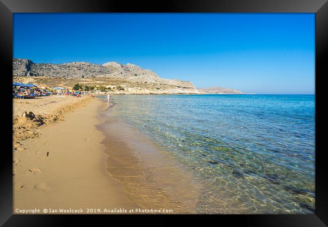 Agathi Beach on the Island of Rhodes Greece Framed Print by Ian Woolcock
