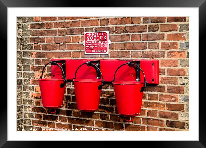 Fire buckets Framed Mounted Print by Clive Wells