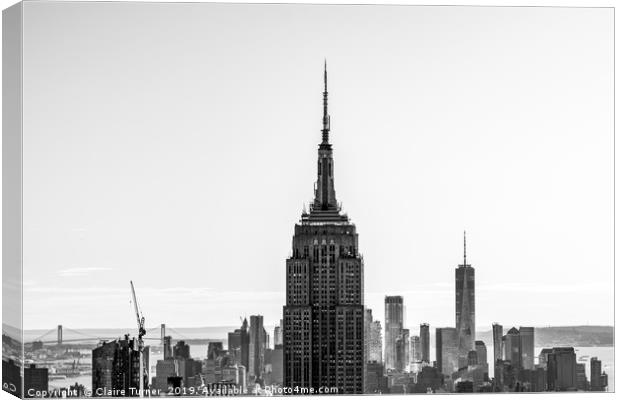 New York skyline and the Empire State Building Canvas Print by Claire Turner