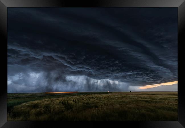 Thunderstorm over kansas Framed Print by John Finney