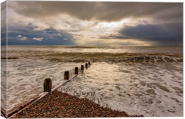 High tide and November Skies Canvas Print by Malcolm McHugh