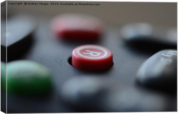 Remote control button Wording  Capturing the Momen Canvas Print by Andrew Heaps