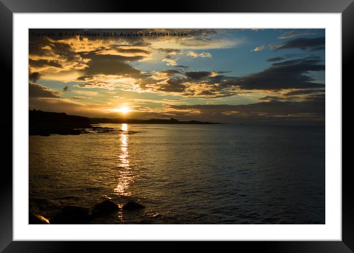 Sunset over bay in Northumberland coastline. Framed Mounted Print by Andrew Heaps