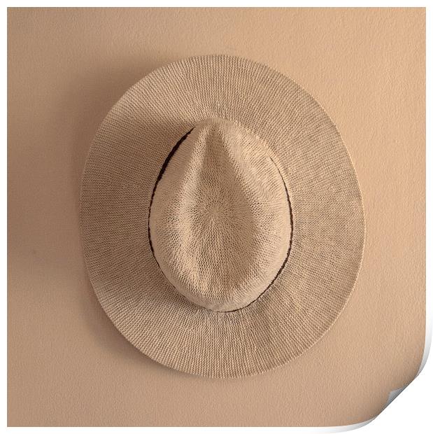 Hat hanging on wall Print by David Bigwood
