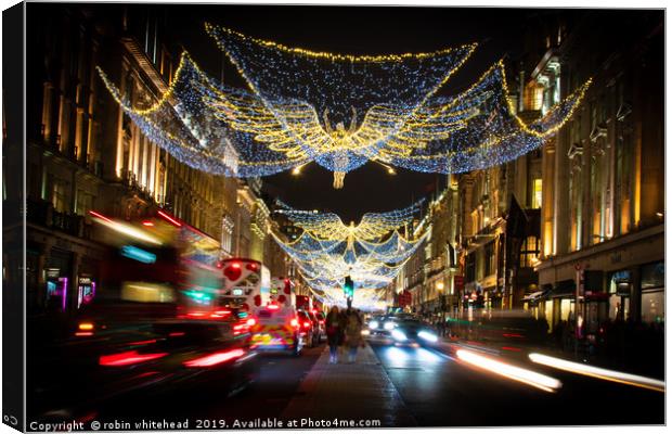 Christmas in Regent Street. Canvas Print by robin whitehead