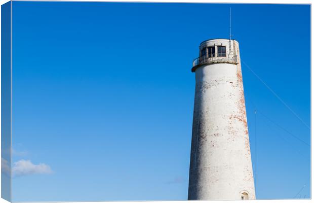 Leasowe Lighthouse against a blue sky Canvas Print by Jason Wells
