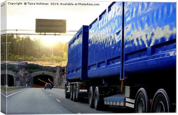 Blue Freight Truck Drives Towards Tunnel Canvas Print by Taina Sohlman