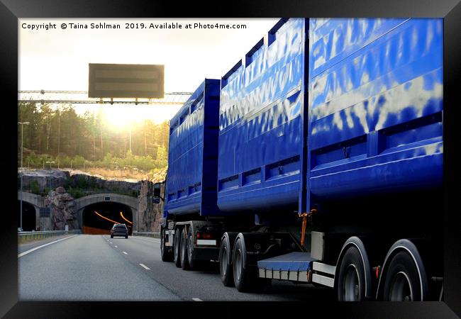 Blue Freight Truck Drives Towards Tunnel Framed Print by Taina Sohlman