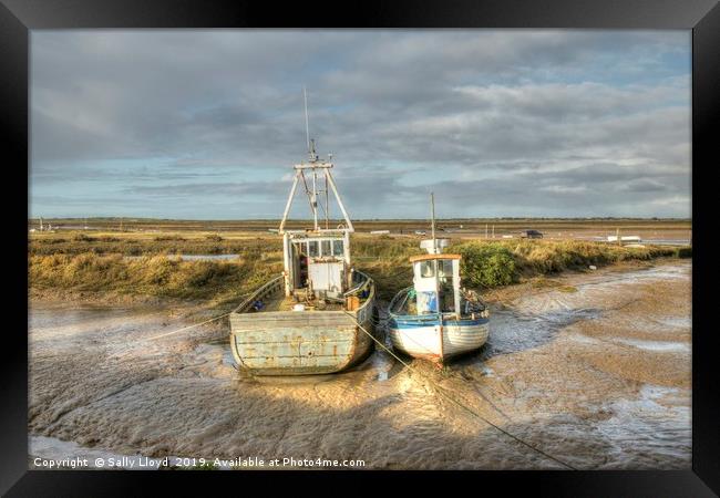 Low tide boats at Brancaster Framed Print by Sally Lloyd