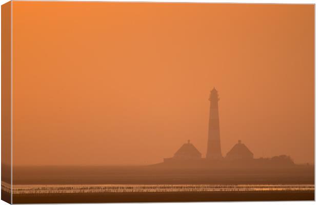 Westerhever Lighthouse at sunset Canvas Print by Thomas Schaeffer