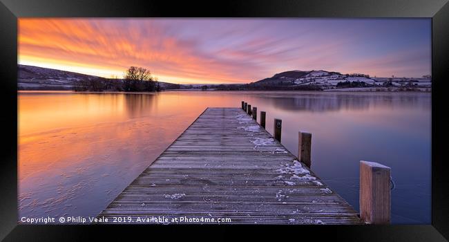 Llangorse Lake Jetty Fiery Sunrise. Framed Print by Philip Veale