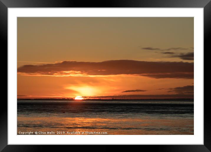 Sunset at Snettisham in Norfolk Framed Mounted Print by Clive Wells