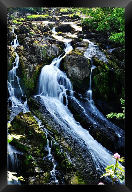 Waterfall Wales Framed Print by Kerim Mehmet