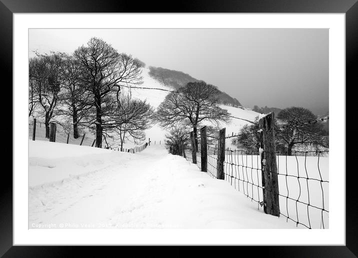 Reservoir Road Cwmtillery during heavy snowfall. Framed Mounted Print by Philip Veale