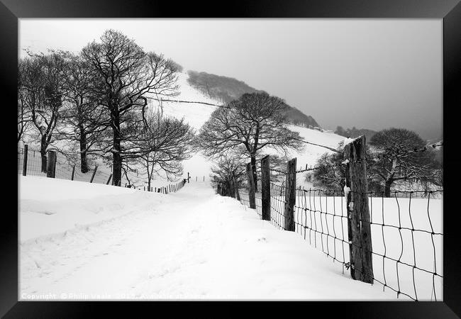 Reservoir Road Cwmtillery during heavy snowfall. Framed Print by Philip Veale