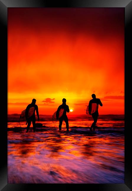 Widemouth Bay,  Surfers at sunset, Cornwall Framed Print by Maggie McCall