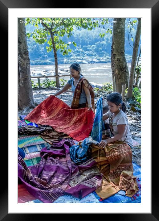 Preparing cloth for market, Laos. Framed Mounted Print by Robert Murray