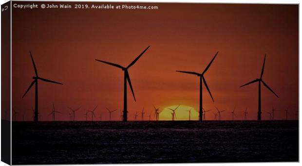 Windmills at Sunset  Canvas Print by John Wain