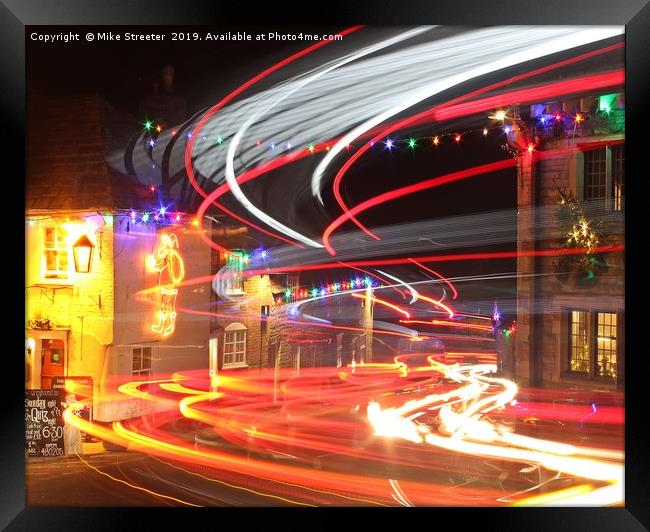 Christmas light trails Framed Print by Mike Streeter