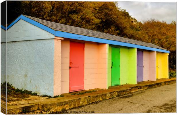 Colourful huts at Folkestone sea front Canvas Print by Clive Wells