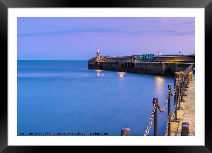 Folkestones Lighthouse at night Framed Mounted Print by Clive Wells