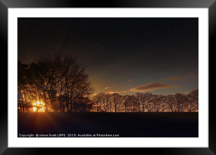 Big sunset glow through winter trees Framed Mounted Print by Simon Bratt LRPS