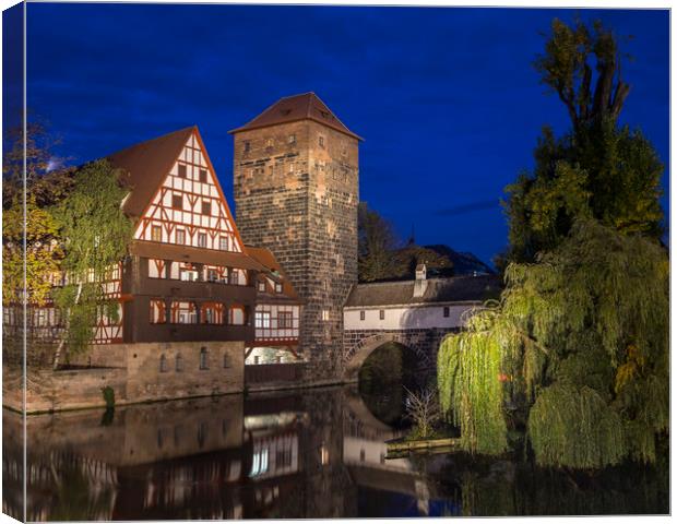 Weinstadel House and Pegnitz River in Nuremberg Canvas Print by Chris Dorney