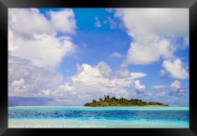 Uninhabited snall island in the blue ocean Framed Print by Jenny Rainbow