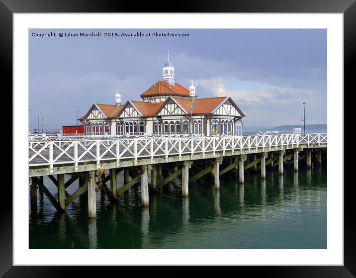 Grey skies over Dunoon Pier. Scotland. Framed Mounted Print by Lilian Marshall