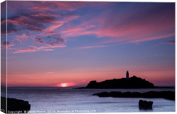 Godrevy lighthouse at sunset Canvas Print by David Moore