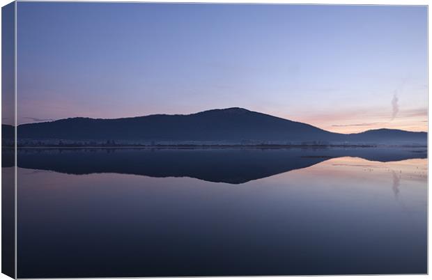 Cerknica lake at dawn, Notranjska, Slovenia Canvas Print by Ian Middleton