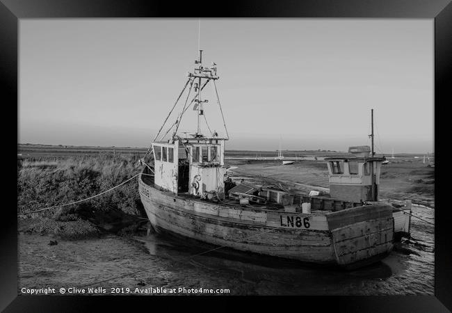 Monochrone fishing boat at Brancaster Staith Framed Print by Clive Wells