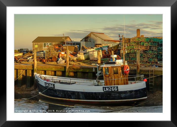 Fishing boat at Brancaster Staith in Norfolk Framed Mounted Print by Clive Wells