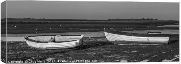 Rowing boats at Brancaster Staith, Norfolk Canvas Print by Clive Wells