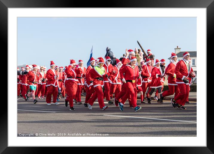 Santa Fun Run at Folkstone in Kent Framed Mounted Print by Clive Wells