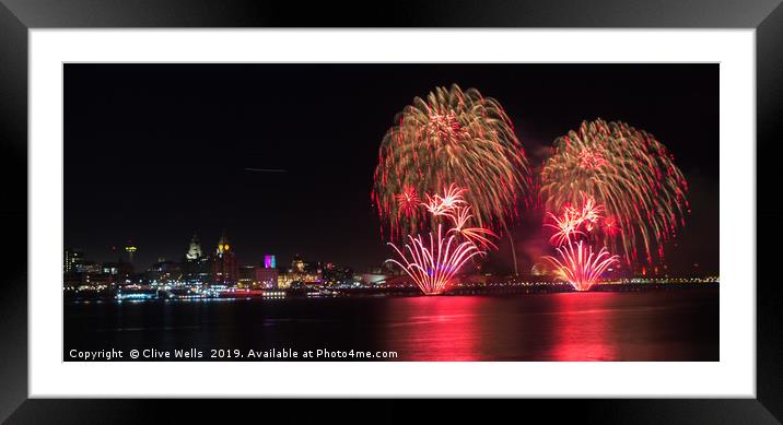 Fireworks over the waterfront at Liverpool Framed Mounted Print by Clive Wells