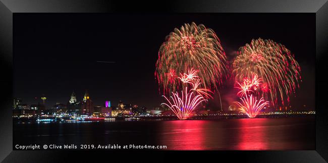 Fireworks over the waterfront at Liverpool Framed Print by Clive Wells