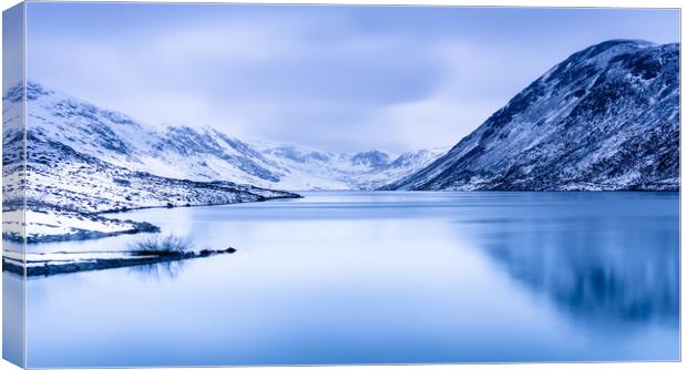 Loch Turret blue hour with snow covered mountains Canvas Print by David Moore